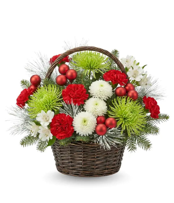 Decorative flower basket with red, green, and white flowers on a white background