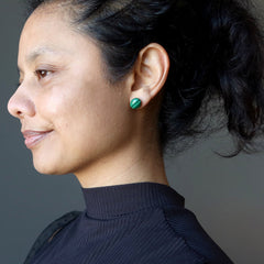 woman modeling malachite stud earrings