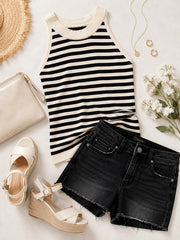Tea-Shirt Shoppe striped halter tank paired with black denim shorts, wedge sandals, and a clutch on a flat lay.