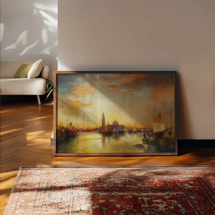Ducal palace Sunset Print by Thomas Moran framed, leaning on a wooden floor beside a rug