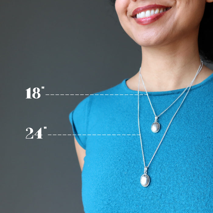 female wearing silver muonionalusta oval necklaces to show length differences