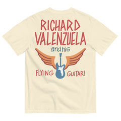 Cream colored Comfort Colors shirt with vintage-style text that reads 'Richard Valenzuela and his Flying Guitar' with an image of a blue guitar and orange wings from Sew Bonita in Corpus Christi, Texas