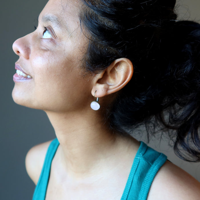 sheila of satin crystals wearing rose quartz leverback earrings